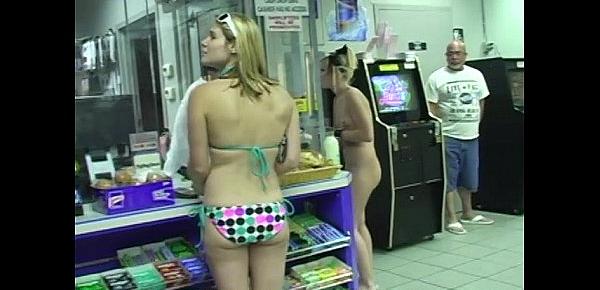  Blonde teen walks into market nude